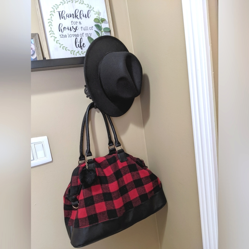 Red checkered duffle bag